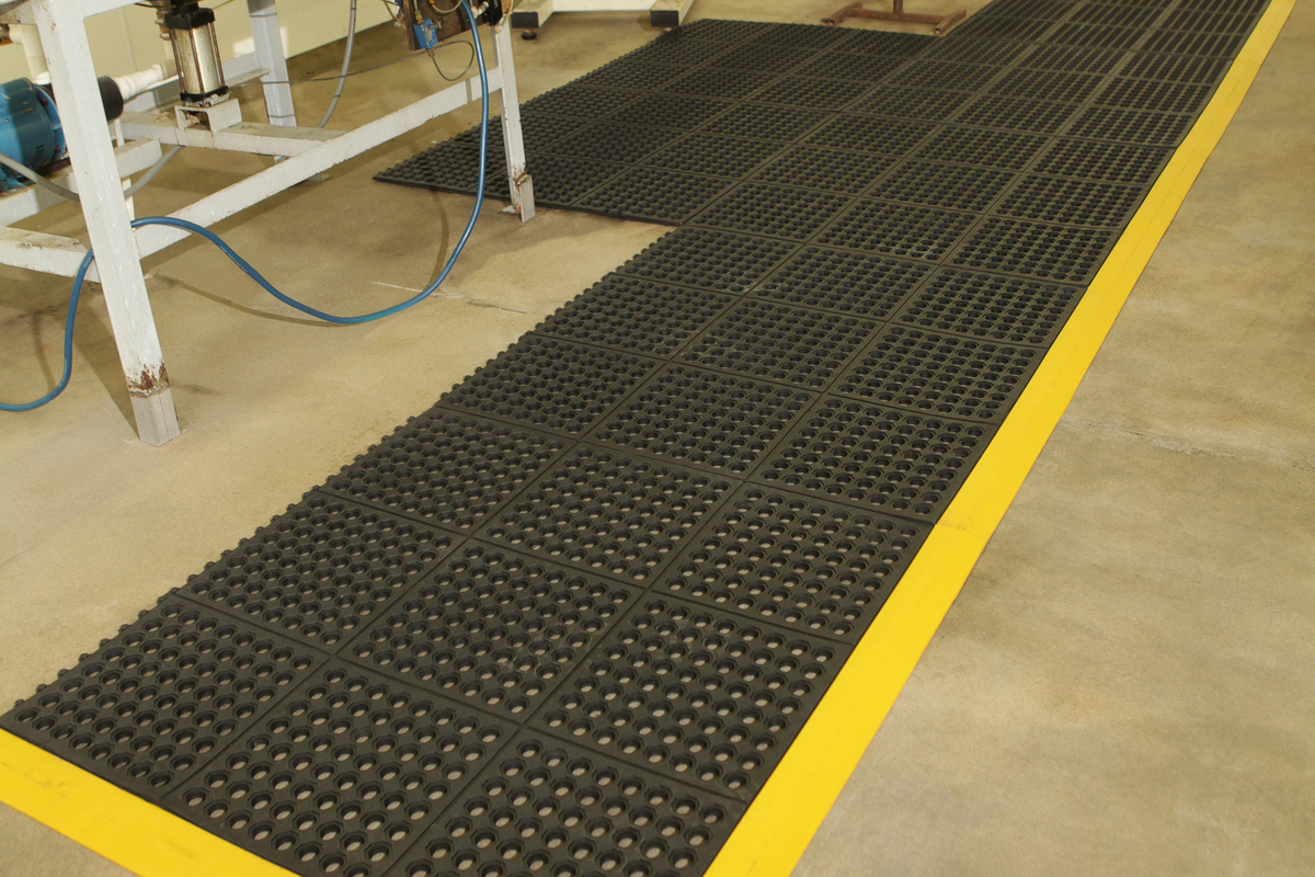 Anti-fatigue mat in a New Zealand industrial workplace setting